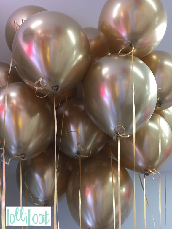 Bunch of gold chrome balloons