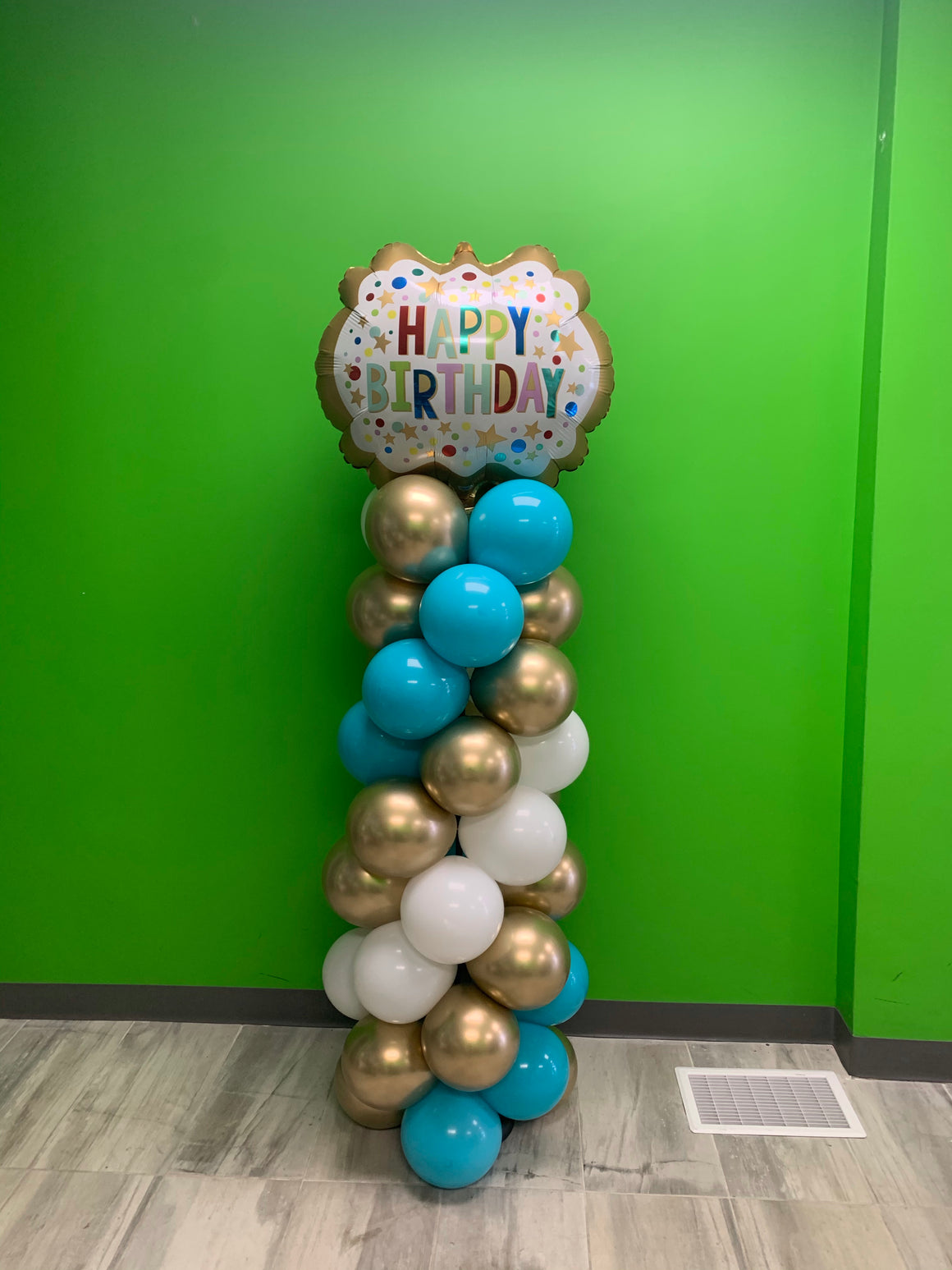 Happy birthday balloon pillar