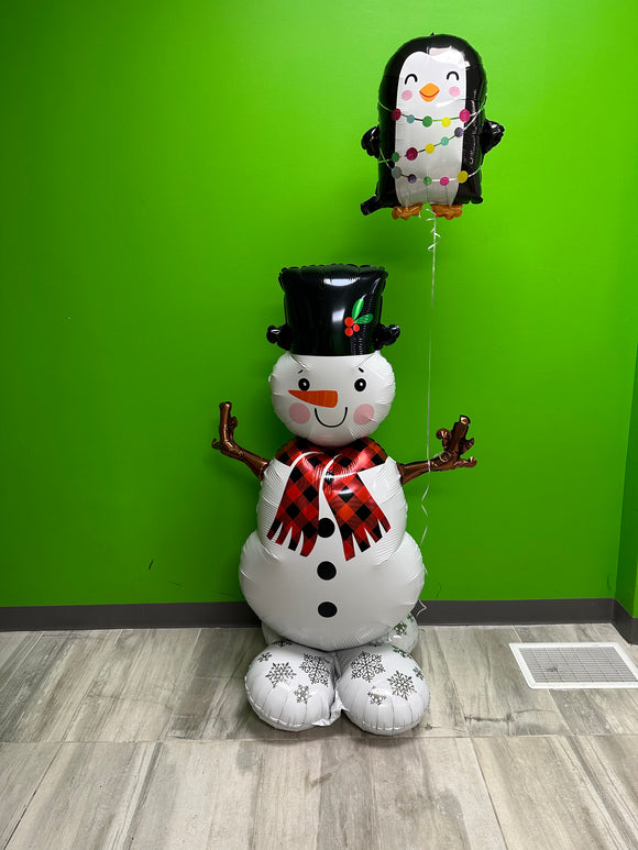 A snowman and his penguin