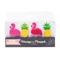 Flamingos and pineapples candles